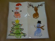 an open christmas card with pictures of animals and snowmen on the front, including a tree