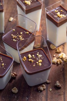 chocolate pudding with nuts and milk in glass containers on a wooden table, text reads birds milk parfaits sour cream jello