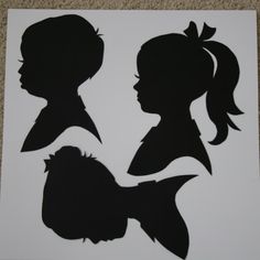 the silhouettes of two children's heads are shown in black on white paper