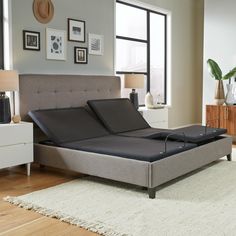 an image of a bed that is in the living room