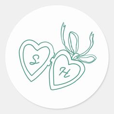 two heart shaped stickers with the words love and peace written in green ink on a white background