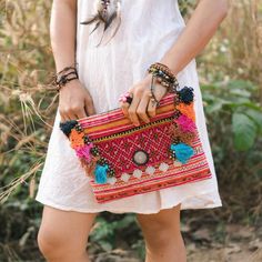 Hmong Embroidered Clutch Bag for Women Unique Handbag with | Etsy Bohemian Clutch Bag With Tassels, Bohemian Tassel Clutch Bag, Festival Bags With Tassels As Gifts, Multicolor Tassel Pouch Bag, Rectangular Bags With Multicolor Embroidery And Tassels, Travel Clutch Bag With Tassels, Bohemian Woven Pouch Clutch, Embroidered Multicolor Pouch For Festival, Bohemian Clutch Shoulder Bag With Tassels