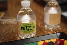 a bottle of water sitting on top of a table