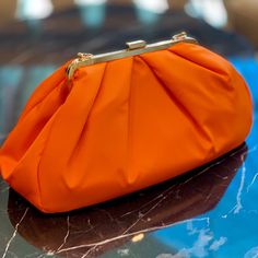 ANNI TERIANI Just Color Handmade Orange Frame - Small Clutch - Bright Bag - Printed Shoulder Strip https://www.etsy.com/listing/745868600/anni-teriani-just-color-handmade-orange?utm_source=crowdfire&utm_medium=api&utm_campaign=api Bright Bag, Orange Handbag, Dumpling Bag, Frame Purse, Orange Satin, Designer Clutch, Small Clutch, Bag Designs, One Bag