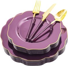 purple plates with gold trim and forks on them