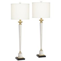 a pair of lamps sitting next to each other