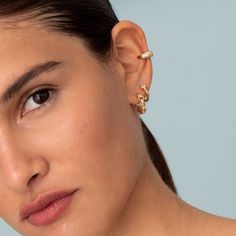 Delicate and fashion dainty ear cuff made to wear it at the lobe of the ear, no piercing needed, is made of 925 Sterling Silver 18kt gold plated with cubic zirconia gemstones. Details: * 925 Sterling Silver 18kt gold plated * Also available in 925 sterling silver.  * Nickel free * Sold individually * White Zircon  All jewellery comes in beautiful packaging, gift-ready. Made with love! Feel free to contact me with any questions :) Visit our e-shop http://www.bylia.es and take a look at By Lía ETS Elegant Cubic Zirconia Cartilage Earrings Tarnish Resistant, Elegant Tarnish-resistant Cubic Zirconia Cartilage Earrings, Trendy Huggie Ear Cuff As A Gift, Trendy Huggie Ear Cuff Gift, Elegant Silver Huggie Ear Cuff, Trendy Cubic Zirconia Single Cartilage Earring, Elegant Cubic Zirconia Ear Climbers, Trendy Wedding Jewelry With Matching Earrings, Trendy Wedding Jewelry Set With Matching Earrings