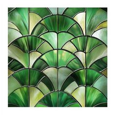 an art deco glass panel with green leaves framed print by panoramic images