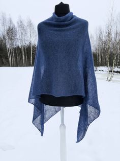 READY TO SHIP Wool Poncho Mohair Silk Wrap Evening Shawls Wraps Spring Poncho Warm Cape Knitted Navy Blue Poncho Oversized Sweater Plus Size Beach Poncho Gift for her Gift for Mom Soft and elegant womens versatile poncho- shawl, oversized sweater, perfect lightweight cover up for any kinds of seasons or occasions. Because of natural kid mohair wool and silk, this ladies poncho is warm and breathable.  Material : 75 % kid mohair                   25 % silk Colour: Navy Blue Size: One size for S,M Blue One Size Shawl For Winter, Blue Cozy Poncho One Size, Blue One-size Winter Shawl, Blue Shawl Poncho For The Beach, Blue Shawl Poncho For Beach, Oversized Sweater Plus Size, Evening Shawls And Wraps, Winter Poncho, Boho Wear