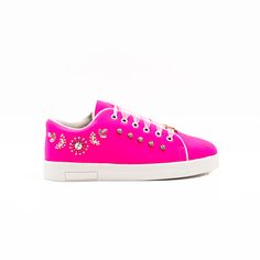 The Juniper Luxury Hot Pink Suede Hand Embellished Tennis Shoe   This Juniper Luxury Hot Pink Suede Hand Embellished Tennis Shoe feature a heavy satin hand embellished upper adorned with a variety of luxury dazzling beads, a chunky, styled rubber sole and matching organza laces fed through contrast detail eyelets. Each pair is finished with a RR custom logo bar for extra luxury.  Key Point: Sole height: 4cm, Material: Satin, Style number: RR1075 Upper: 95% Polyester / 5% Elastane, Sole 100% Rubber  Due to the nature of the fabric, and the hand embellished finish this product is not suitable for machine washing. Unlike leather and other man made fabric, Suede can be very easily ruined by water, which causes stains on its surface that are generally irreparable. As such it’s best not to wear Satin Style, Satin Hands, Stocking Fillers For Her, Pink Suede, Suede Shoes, Custom Logo, Luxury Shoes, Badger, Tennis Shoes