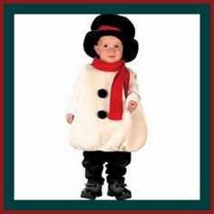 a little boy dressed in a snowman costume and hat with a red scarf around his neck