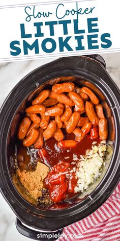 slow cooker filled with little smokies and spices