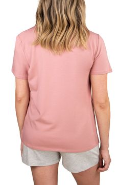 Made with a tulip-hem overlay for quick nursing access, this relaxed T-shirt is sure to be a mainstay for on-the-go parents. Surplice crewneck   Short sleeves   47% Tencel® modal, 47% cotton, 6% elastane   Tencel modal is a sustainably produced fiber made with closed-loop processing and is certified with the EU Ecolabel as having a low environmental impact throughout the entire lifecycle   Machine wash, tumble dry   Made in Turkey   OEKO-TEX®–certified materials free of harmful substances Spring Solid Color Nursing Tops, Comfortable Pink Tops For Spring, Comfortable Pink Crew Neck Top, Comfortable Pink Cotton Top, Cotton Nursing Friendly Tops, Cotton Nursing-friendly Tops, Comfortable Pink Short Sleeve Top, Casual Nursing Friendly Short Sleeve T-shirt, Casual Cotton Nursing-friendly Tops