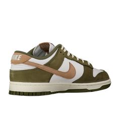 Experience autumn elegance with the Nike Dunk Low Retro. Featuring a tasteful blend of medium olive, hemp, and white, these sneakers boast a premium feel with a mix of leather, mesh, and suede. With a durable design and comfortable fit, they are perfect for all your seasonal adventures. Khaki Sneakers With Vulcanized Sole, Khaki Sneakers With Vulcanized Sole And Round Toe, Green High-top Sneakers With Gum Sole For Streetwear, Casual Khaki Sneakers With Vulcanized Sole, Khaki Low-top Sneakers With Vulcanized Sole, Green Gum Sole Sneakers For Streetwear, Green Sneakers With Gum Sole For Streetwear, Khaki Lace-up Sneakers For Streetwear, Urban Green Custom Sneakers With Gum Sole