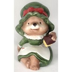 Bring a touch of holiday cheer to your home with this vintage Christmas Bear figurine from HOMCO. Crafted from ceramic with a multicolor design, this collectible is perfect for adding a festive touch to your decor. Handmade in Taiwan during the 1980s, this figurine features a jolly and friendly expression, making it a great addition to any Christmas decor. Add a personal touch to your home with this HOMCO Christmas Bear figurine. Perfect for collectors and holiday enthusiasts alike, this vintage Vintage Holiday Decor, Bear Figurine, Christmas Bear, Vintage Holiday, Holiday Cheer, Vintage Christmas, Taiwan, Holiday Season, Seasonal Decor