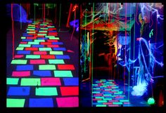 an art installation with neon colored tiles on the floor