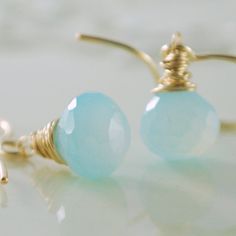 Chalcedony Earrings Aqua Gold Jewelry by livjewellery on Etsy, $45.00 Elegant Wire Wrapped Chalcedony Jewelry, Handmade Light Blue Aquamarine Jewelry, Adjustable Chalcedony Jewelry For Anniversary, Elegant Light Blue Faceted Jewelry, Handmade Chalcedony Earrings For Gifts, Aquamarine Beaded Jewelry For Gifts, Handmade Chalcedony Earrings As Gift, Light Blue Round Beaded Jewelry For Gifts, Chalcedony Round Bead Jewelry For Gifts