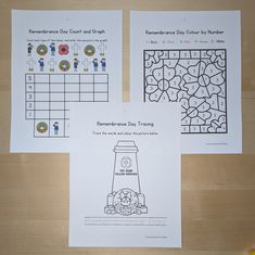 three worksheets for remembrance day and other activities on a wooden table with scissors