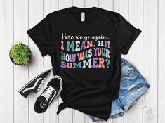 Here We Go Again... I Mean, Hi! How Was Your Summer? Back to School T-Shirt Get ready for the new school year with our hilarious and relatable back to school t-shirt! Featuring the playful phrase "Here we go again... I mean, Hi! How was your summer?" this shirt is perfect for teachers who want to start the year with a smile. Made from high-quality fabric, it's comfortable for all-day wear and a great conversation starter in the classroom. Key Features: High-quality Roland heat soft premium vinyl Back To School Funny, Secretary Gifts, School Secretary, Office Shirt, Teaching Shirts, School Staff, The Office Shirts, Teacher Style, Sarcastic Shirts