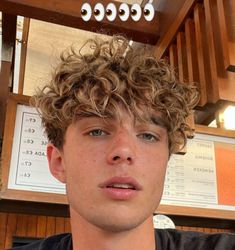 Mens Honey Blonde Hair, Wavy Perm Blonde Hair, Blond Curls Men, Light Brown Curly Hair Men, Curly Blonde Hair Boy, Honey Brown Hair Men, Men’s Hair Highlights Brown, Brown Hair With Highlights Men, Blond Curly Hair Boy