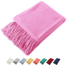 various colors of towels with fringes on them