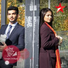 a man and woman standing next to each other in front of a building with the words star plus on it