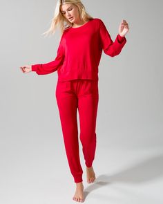 Relax—it doesn't have to be a Sunday to enjoy the soft, easy-going comfort of our Sunday Lounge Set. You can kick back in modern head-to-toe style anytime. The long-sleeved scoop neck top has side slits for added ease, while the drawstring pants have side seam pockets and elasticized cuffs to complete the look. Details Long sleeves Scoop neck Drawstring waist Pockets 28" inseam Banded bottoms 96% rayon, 4% spandex. Machine wash cold. Imported. Casual Long Sleeve Solid Color Top For Loungewear, Casual Long Sleeve Top For Loungewear, Sporty Long Sleeve Top Relaxed Fit For Loungewear, Stretch Long Sleeve Top For Loungewear, Long Sleeve Winter Loungewear Top, Solid Long Sleeve Top For Winter Loungewear, Spring Athleisure Long Sleeve Loungewear Top, Sporty Long Sleeve Top For Loungewear, Solid Color Long Sleeve Top With Thumbholes For Loungewear