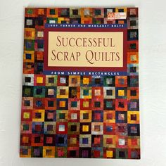 a book with colorful squares on the cover