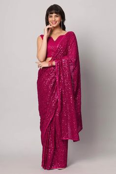 Indulge in the allure of our Tasha Pink Sequins Embroidery Georgette One Minute Saree, where grace meets glamour in a symphony of Pink. Crafted from the ethereal Georgette fabric, this saree is your passport to a world of opulence. With a mesmerizing dance of Heavy Sequins that glisten like stars, it's not just attire; it's an embodiment of enchantment. The included Saree fabric blouse, featuring half sleeves and a sweetheart neckline, completes your transformation into a captivating vision. Pro One Minute Saree, Georgette Material, Formal Saree, Saree With Belt, Vision Pro, Floral Print Sarees, Sequin Saree, Saree Sale, Silk Saree Blouse