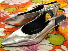 "AMAZING! 60's shoes by COUTURE by TIMPSON🤍 Silver metallic slingbacks.. lovely pointed toes.. delicate adjustable slingback strap🤍 Fab condition... just one mark on side of one shoe..nothing major... see last pic on ETSY listing🤍 🤍🤍any size marking has long gone...comparing them to other shoes I believe they are around a modern UK 4-4.5 ..please check all measurements🤍🤍  💜Internal insole (to where toe would fall..not to end of point) is approx 9 1/4\" 💜Internal insole to very end of po Vintage Kitten Heels With Pointed Toe For Spring, Retro High Heel Slingback Pumps For Spring, Vintage Slingback Pumps For Spring Formal, Retro Formal Slingback Pumps With Pointed Toe, Vintage Ankle Strap Slingback Pumps For Party, Vintage Slingback Heels For Party, Vintage Slingback Pumps For Spring, Vintage Slingback Pumps For Spring Party, Vintage Pointed Toe Slingback Pumps For Summer