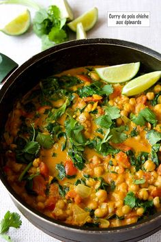 a pot filled with some food and garnished with cilantro