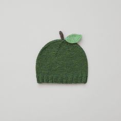 "The cutest green apple hat will add the perfect finishing touch to your baby's outfit. Handmade from a beautiful blend of cotton and merino wool, this hat feels so wonderfully soft and is great all year around.  This knitted beanie in fruit design would be a great accessory for your little one's funny photo shoot.  Each hat is hand-knitted with love and care by my lovely mother and a grandmother of three. This cotton merino hat is a truly special gift for welcoming a new baby in your life.   We use only premium quality yarn. Since cotton and merino wool are both hypoallergenic natural fibres, they are less likely to cause irritation or allergies than synthetic materials. This yarn is very soft, breathable and absorbent - which make it a great choice for a delicate baby skin.   Size:  0-1 Merino Hat, Apple Hat, Fruit Baby, Knit Baby Hat, Funny Photo, Baby Hats Knitting, Knitted Beanie, Natural Fibres, Fruit Design