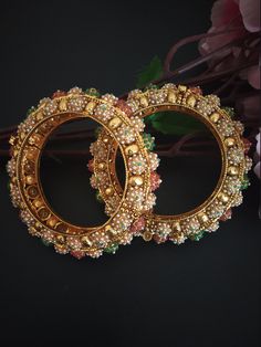 Handmade item Traditional Padmavati Kada Bangels in Multi-Color Rajwadi Bangles with High Quality Kundan/ AD Ruby Stones Indian Jewelry Rajwada Kada Inspired from the film Padmavat bangles with AD Stones ( American Diamonds ) ruby detailing in royal rajwadi style size Size Available 2.4, 2.6, 2.8 Fashion Empire Studio gives you new look, Made of high quality material(s). This is very Designer, Tradition Kada . Every Women wants Wear Something new and Stylish Items so this is only for u. Its A Ch Fusion Style Bangle For Wedding And Diwali, Fusion Meenakari Bangle For Festivals, Fusion Meenakari Bangle For Festive Season, Fusion Cutdana Bangle For Diwali, Fusion Style Cutdana Bangle For Diwali, Fusion Style Cutdana Bangle For Festivals, Festive Fusion Meenakari Bangle, Festive Fusion Cutdana Bangle, Festive Kundan Fusion Bangle