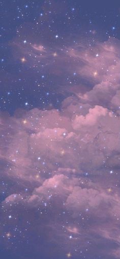 the sky is filled with stars and clouds