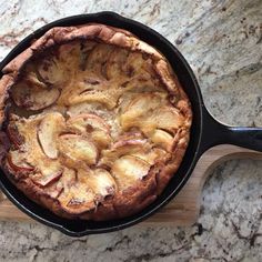 an apple pie in a cast iron skillet