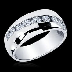 a white gold ring with diamonds on it