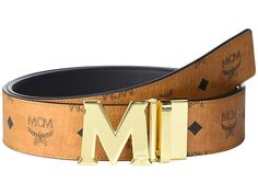 MCM Claus Reversible Belt - Men's Belts : Cognac : Keep your opulent options open wearing the MCM Claus Reversible Belt. Leather belt with a gold-tone logo shaped buckle. Single hardware strap keeper. Reversible design. Spot clean. Imported. Measurements: Width: 1 3 4 in First Hole Length: 47 in Last Hole Length: 43 in Weight: 10 oz Boat Shoes Fashion, Logo Shapes, Men's Belts, Belt Leather, Reversible Belt, Mens Belts, Leather Belt, Cognac, Boat Shoes