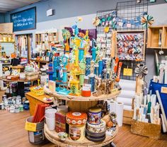 the inside of a craft store with lots of items on display and in front of it