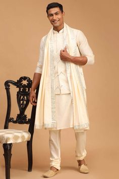 Buy Men's Cream Viscose Mirror Work Embroidered Kurta Pajama Jacket Set With Dupatta Online Mirror Work Kurta For Men Wedding, Wedding Cotton Sherwani With Mirror Work, Traditional Cotton Sherwani With Mirror Work, Festival Cream Dupatta With Mirror Work, White Semi-stitched Sherwani With Mirror Work, Mirror Dupatta, Side Tie Shirt, Indian Wedding Clothes For Men, Cream Jacket