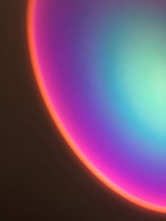 an image of a circular object that appears to be colored in blue and pink colors