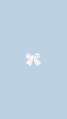 a white bow on a light blue background