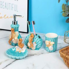 three bathroom accessories on a marble counter top