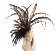 Hats By Cressida Kentucky Derby & Ascot Fascinator Hats Spring Summer Collection Cinna Fascinator Beautiful lady amhurst natural pheasant tail feathers hand curled with a mass of coque and hackle. Base measures 12 inches Mounted with a matching headband. If you prefer a headband to match your hair, please make a note at check out what colour headband you want. This hat is perfect for any special occasion like a wedding, bridal shower or ladies day at the races such as Royal Ascot, Kentucky Derby Elegant Fitted Carnival Headpiece, Fitted Brown Costume Hats And Headpieces For Party, Fitted Brown Costume Hats For Party, Brown Party Fascinator Hat, Cocktail Garden Party, Kentucky Derby Fascinator, Mad Hatter Party, Derby Fascinator, Chocolate Gold