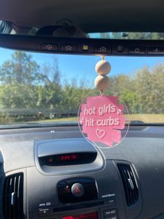 a car dashboard with a sticker that says not girls hit curls