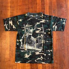 Dope camo hunting T-shirt from the '90s. Big graphic and spellout on front. Amazing condition. Fits like a Men's M (20.5x28.5).  Brand: Logotel Size: M Color: Multi Condition: Excellent Camouflage Letter Print T-shirt For Streetwear, Camouflage Graphic Print Crew Neck T-shirt, Camouflage Graphic Print T-shirt For Streetwear, Camouflage Cotton T-shirt With Sublimation Print, Camouflage Short Sleeve Tops With Sublimation Print, Camouflage Sublimation Print Crew Neck T-shirt, Camouflage Crew Neck T-shirt With Sublimation Print, Camouflage Graphic Tee With Print, Camouflage Cotton T-shirt With Letter Print