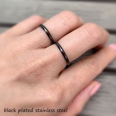 Super thin black ring, wear it alone for the delicate look, or stack it up for the rockstar look! Currently trending as a couple promise ring set! ♥︎ USA - Quick shipping 3-5 working days with tracking for only $5.95! ♥︎ D E T A I L S FEATURES: -stainless steel -super comfortable -glass available in limited quantities SIZES AVAILABLE: -available in size 4 to 10 -no half sizes MATERIAL: -stainless steel with black plating -stainless steel -NOTE, with wear and tear in all rings, scratches will hap Black Promise Rings, Couple Rings Simple, Ace Ring, Sarah Walker, Simple Rings, Ring Couple, Gothic Ring, Rings Black, Promise Ring Set