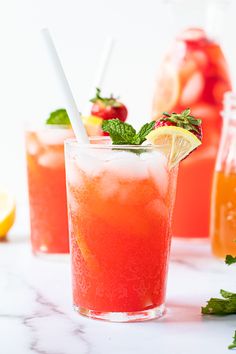 watermelon and cucumber drink in glasses on a white tablecloth with green straws