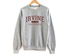 Unisex sized crewneck sweatshirt. The perfect sweatshirt for your favorite city. - Unisex Size - Printed on the Gilden 1800 Sweatshirt - Loose fit - 50% Cotton; 50% Polyester (fibre content may vary for different colors) - Processing usually takes 4-7 and shipping usually takes 3-5 days - Medium fabric (8.0 oz/yd² (271.25 g/m - Sewn in label - Runs true to size Winnipeg Canada, California Sweatshirt, Mesa Arizona, Favorite City, Casual Pullover, Sew-in Labels, Unisex Fashion, Unisex Sweatshirt, Vancouver