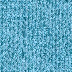 a close up view of a blue fabric texture