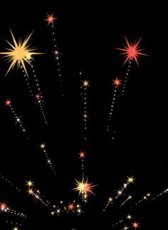 fireworks are lit up in the night sky with bright stars on it's side